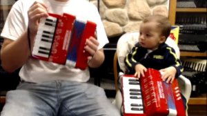 WDTOYPA8R - Red Woodstock Toy Piano Accordion M 17 8 $40