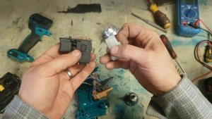 Repairing a Makita DTD153 impact driver with a broken body and faulty switch