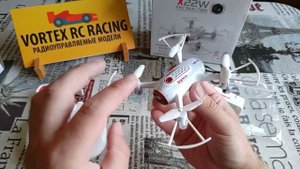 Syma X22W - квадрокоптер с удержанием высоты.