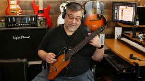 There's a "silent" ACOUSTIC GUITAR in this little bag.... The Donner HUSH-I Travel Guitar!