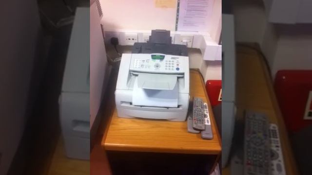 Kenna HQ fax machine lights up