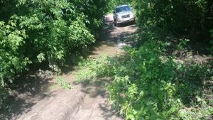 УАЗ Патриот из хутора Долгий. Переплываем яму.