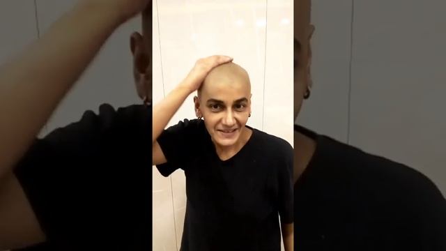 Bald Indian rocking a hair tattoo