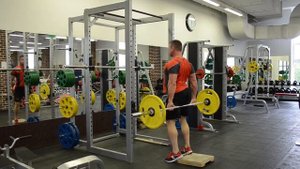 Приседания со штангой за ягодицами с подставки 6 см