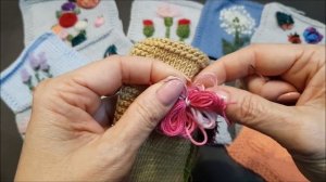 Вышивка на вязаном изделии.  Цветок.