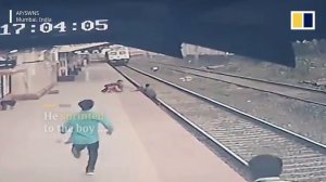 Heroic man saves young boy from oncoming train in India