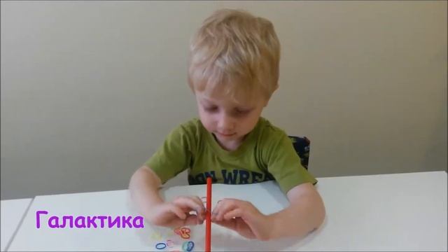 Занятия по развитию мелкой моторики у детей. Резиночки для волос  и карандаш.