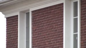 Дом с рустами, второй этаж облицован клинкерной плиткой, фасадная система Церезит