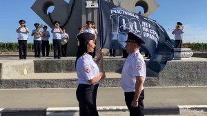 Севастопольские полицейские приняли у коллег из Крыма флаг 100-летия