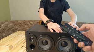 Распаковка акустической системы Edifier D12