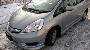 Хонда Фит Шатл , Гибрид 10/2011 год , С Аукциона Японии , без пробега по РФ. Аукционная оценка 3,5 б