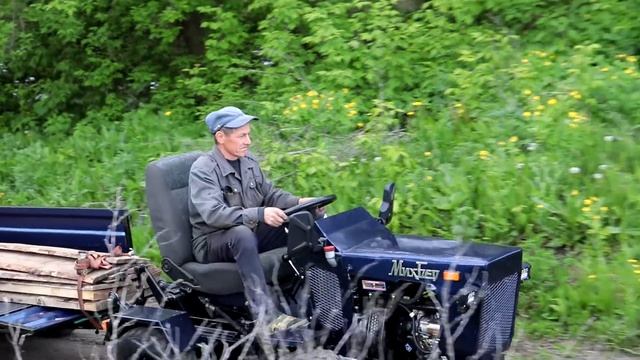 Перевозим шести метровый брус на минитракторе смотреть онлайн