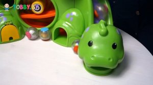 Развивающая игрушка музыкальный динозавр с шариками Fisher Price