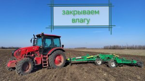 Выравнивание пахоты.Трактор Беларус 1222.3 культиватор Радагостмаш кпу6-пе.