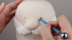 How to Make a 3D Santa Cake - Laura Loukaides