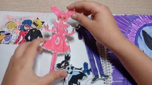 Альбом с рисунками фонов из мульта леди баг и супер кот. Фигурки Маринет и других героев.