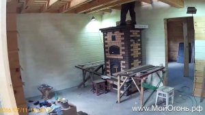 Отопительная печь с духовкой из светлого кирпича