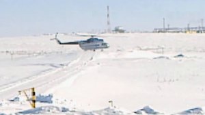 Взлет вертолета на Крайнем Севере
