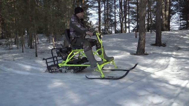 Компактный, полностью разборный мотобуксировщик "Волчок" с лыжным модулем