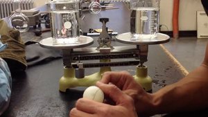 Odd Balance Challenge: Balancing a Steel ball and Pong Pong ball submerged in water.