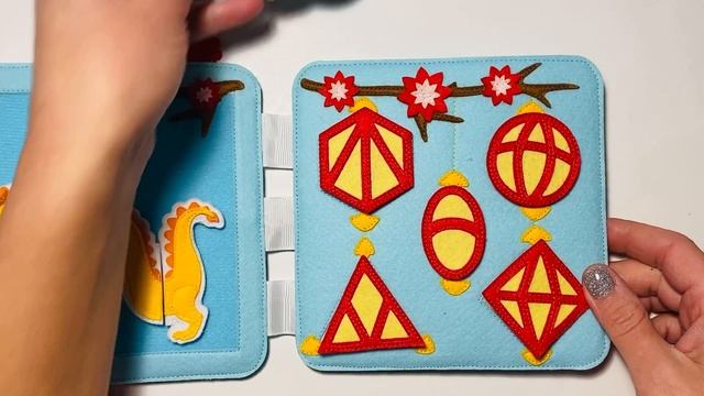 Развивающая новогодняя книга из фетра с символом 2024 года драконом смотреть онлайн