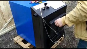 Настройка регулятора тяги на твердотопливном котле длительного горения "Космос"