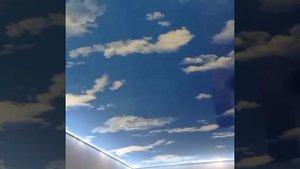 Натяжной потолок в спальную. Облака с подсветкой