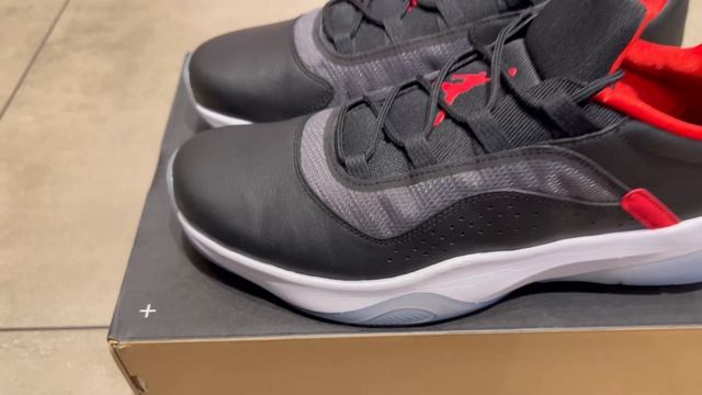 Jordan 11 CMFT Low Black Red White CW0784-006 смотреть онлайн