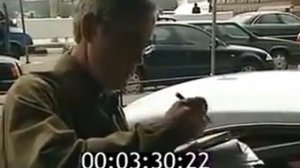 Сергей Бодров-старший и Сергей Бодров-младший выходят из здания аэропорта.