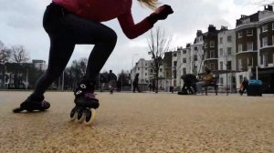 Freestyle inline wizard skating (on a flat set up 3x110) using transitions, crossovers, three turns