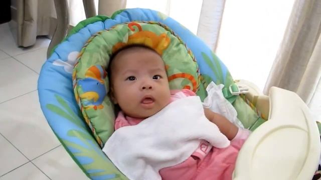 Cammi in her Fisher Price Rainforest Cradle Swing смотреть онлайн