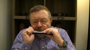 Willard Losinger Performs "Moon River" on the Harmonica