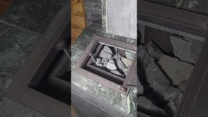 Печь Гефест в облицовке змеевик.