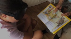 Child Explains Reading Blindfolded