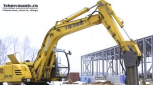 Экскаватор с гидромолотом видео