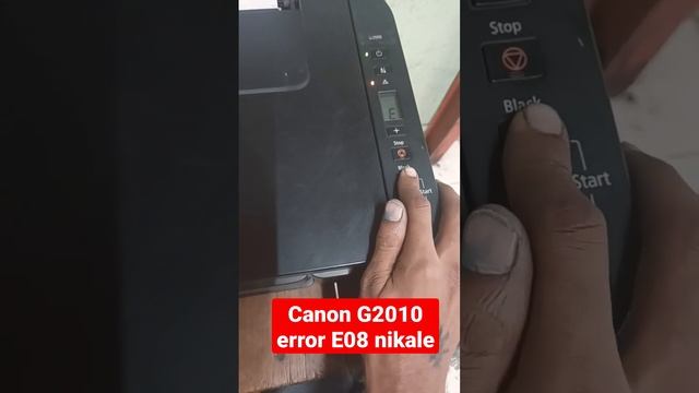 Canon G2010 error E08 nikale