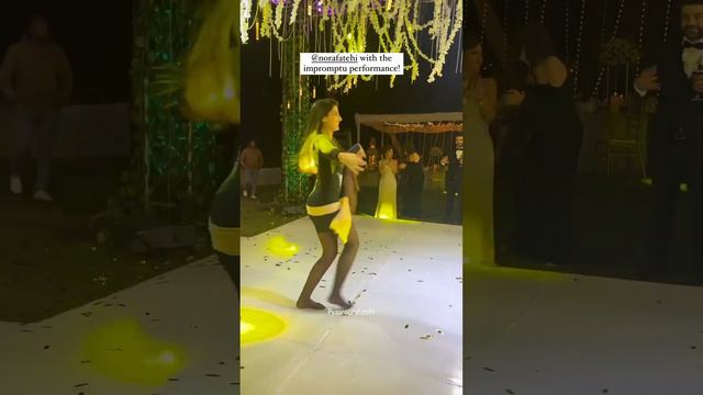 Nora Fathi dances at her friend's wedding