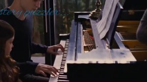 The Twilight Saga Breaking Dawn - Edward, Bella and Renesmee happily playing piano