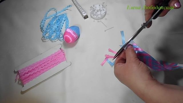 Пасхальные яйца, оплетенные атласными лентами