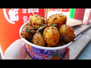 Китайская кухня. Уличная еда Сианя (Китай) – острый жареный картофель.