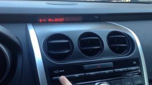 Mazda CX-7!как выставить часы!