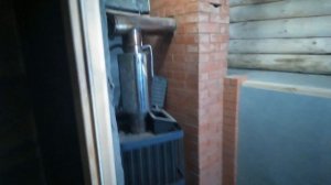 Отопительный щиток в парной к чугунной печи .