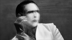 Marilyn Manson- Cupid Carries A Gun