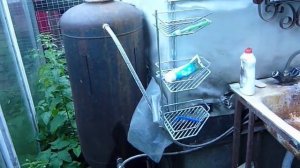 Водонагреватель в саду на даче