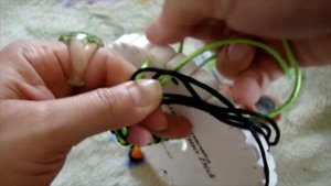 Плетеный браслет Кумихимо.