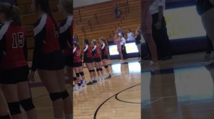 Hailie Shemek singing National Anthem at Sherrard volleyball game