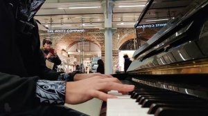 Skateboarder in hoodie amazes public with sublime piano music