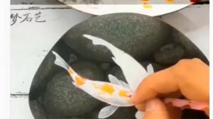 Рисунки на камнях Рыбки