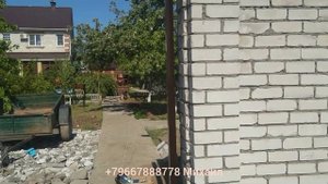 Откатные ворота со встроенной калиткой.