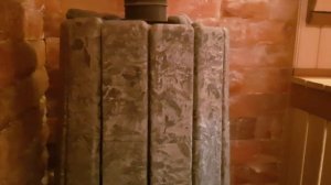 Банная печь Комета Вега Grill'D в облицовке серпентинитом. Обзор в интерьере бани